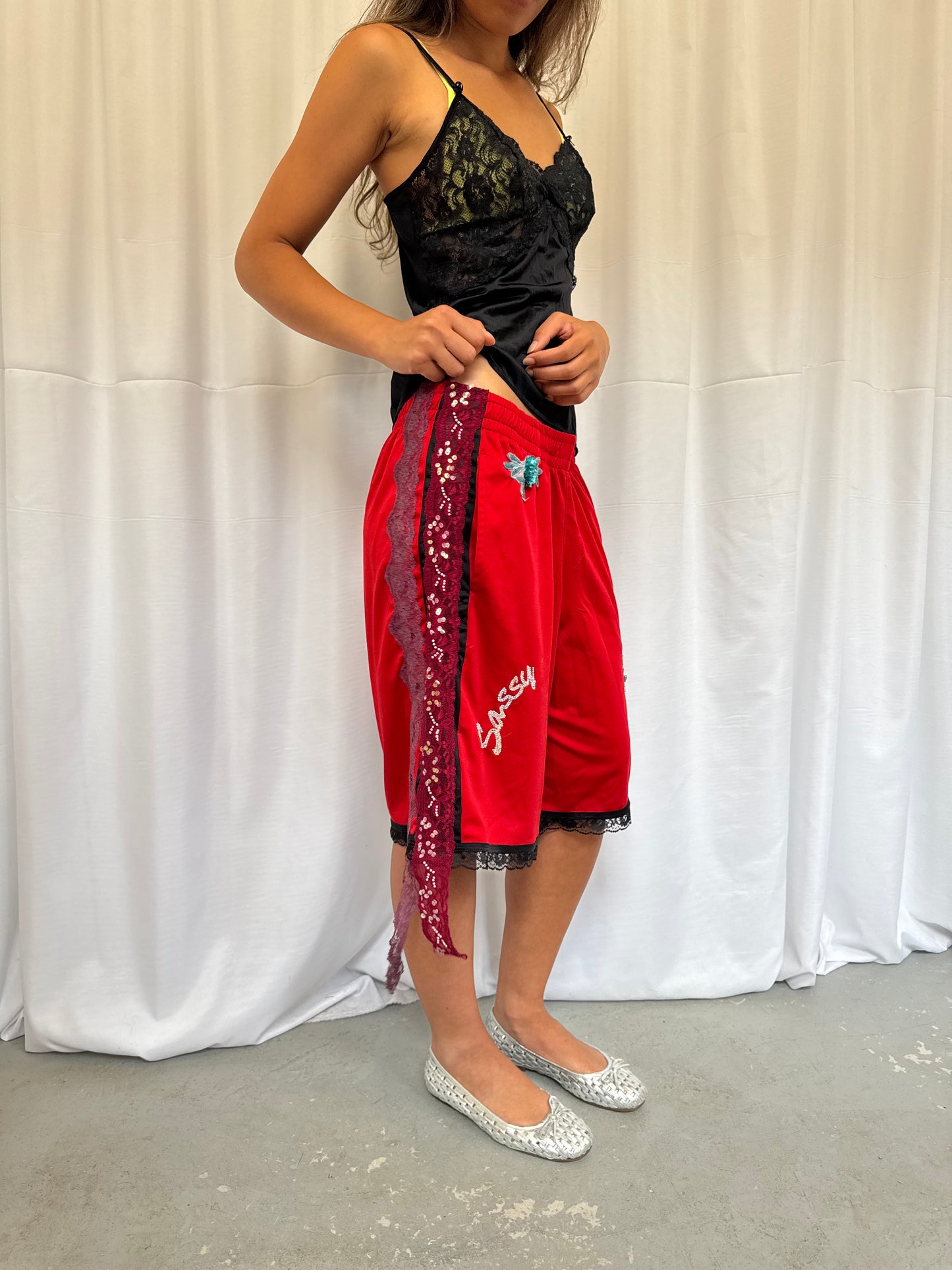 Red shorts with burgundy lace