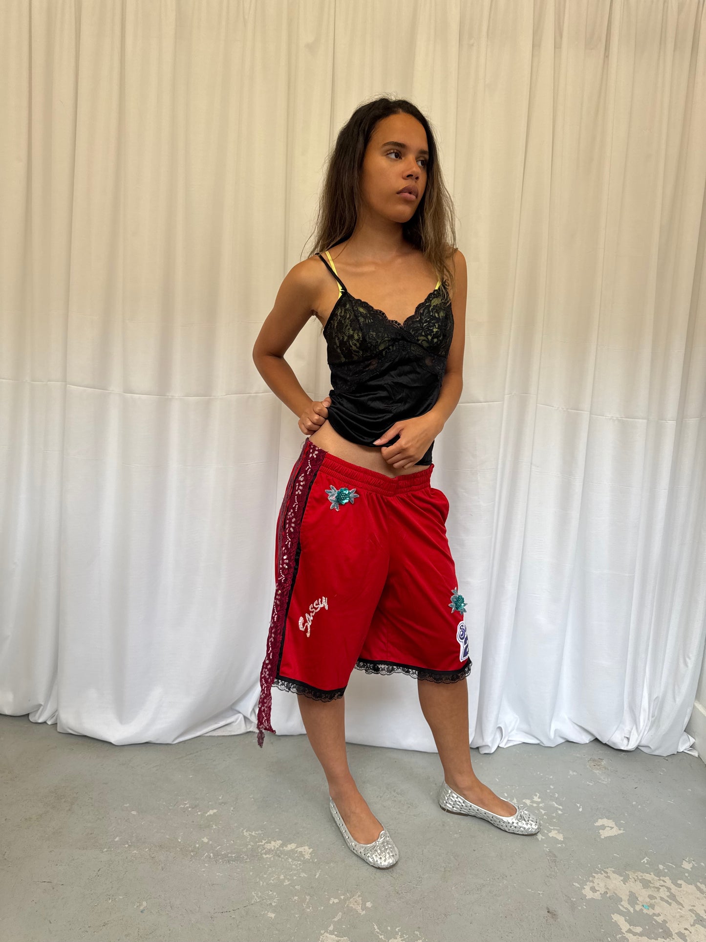 Red shorts with burgundy lace