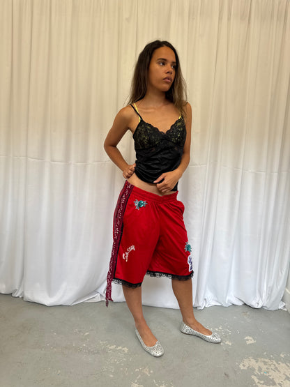 Red shorts with burgundy lace
