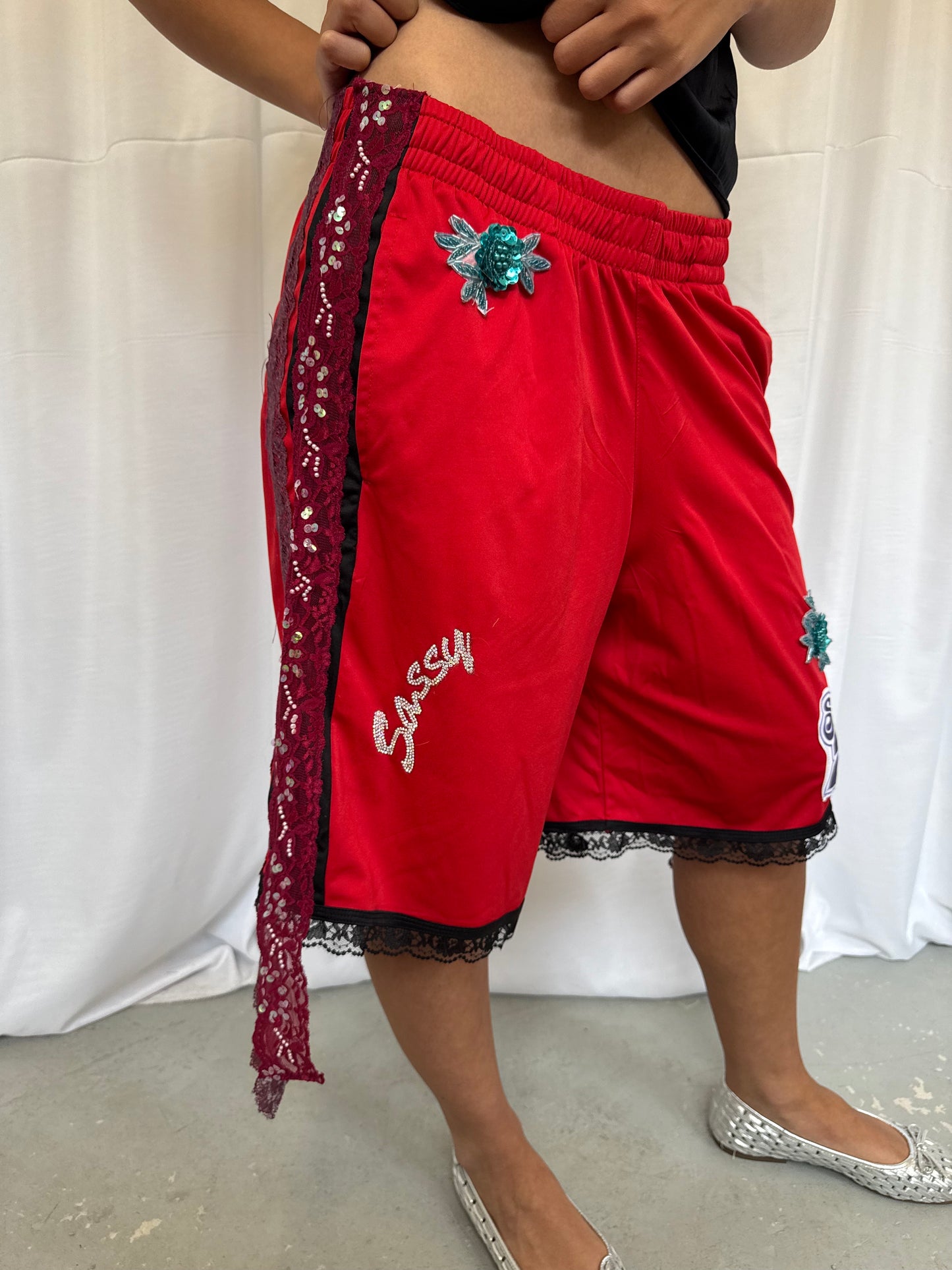 Red shorts with burgundy lace