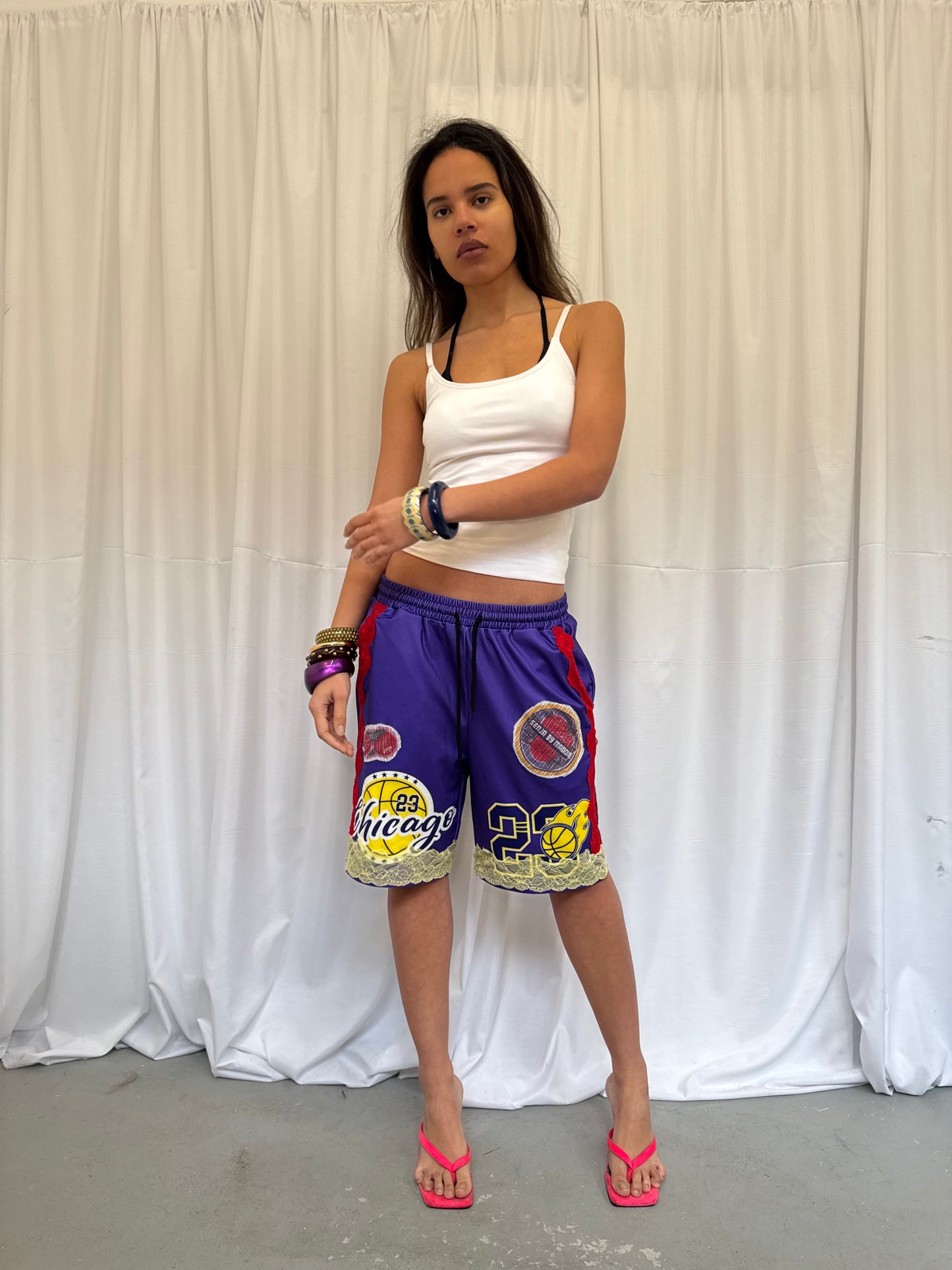 Purple Basketball Shorts with Yellow Lace Trim