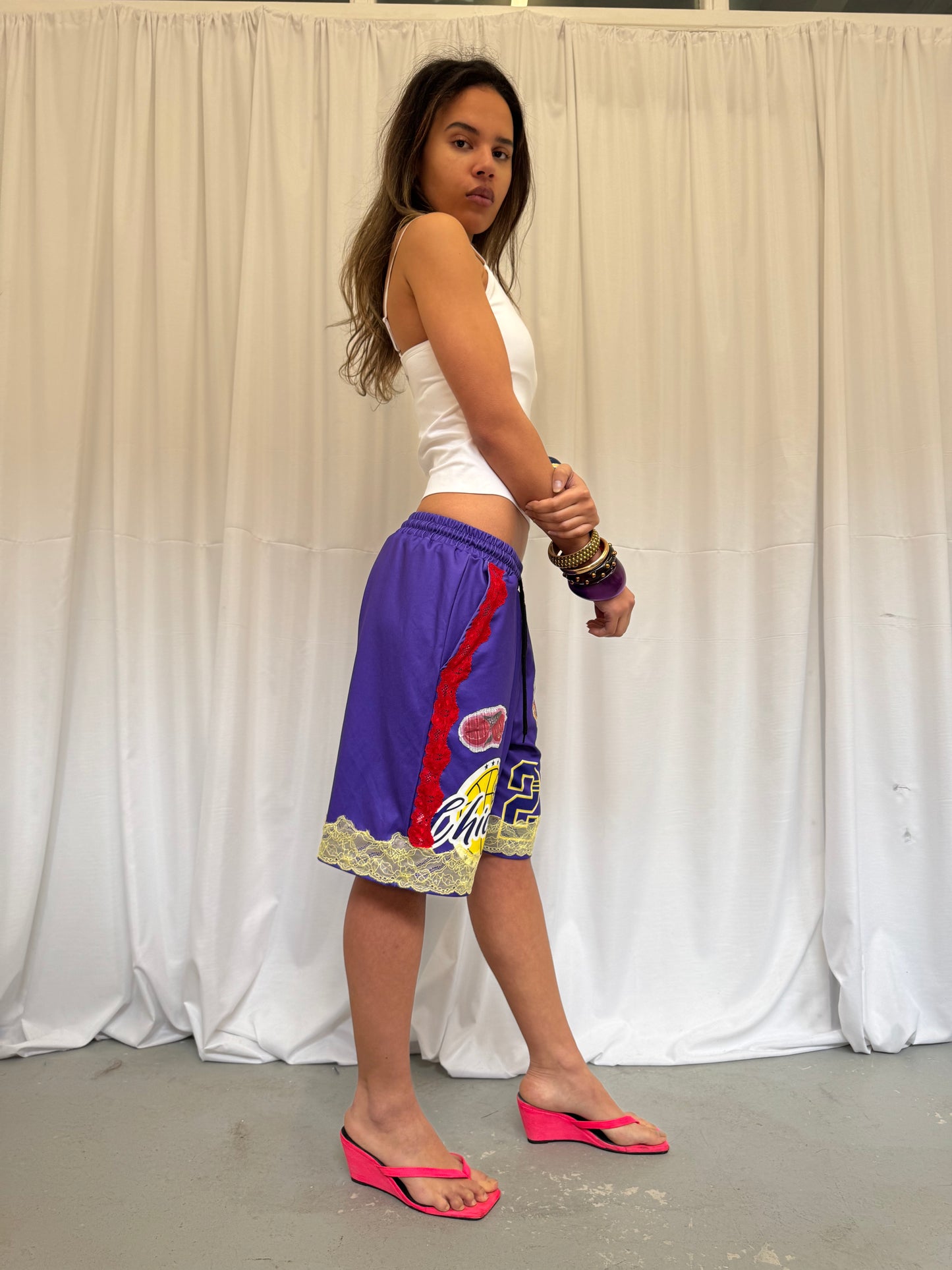 Purple Basketball Shorts with Yellow Lace Trim