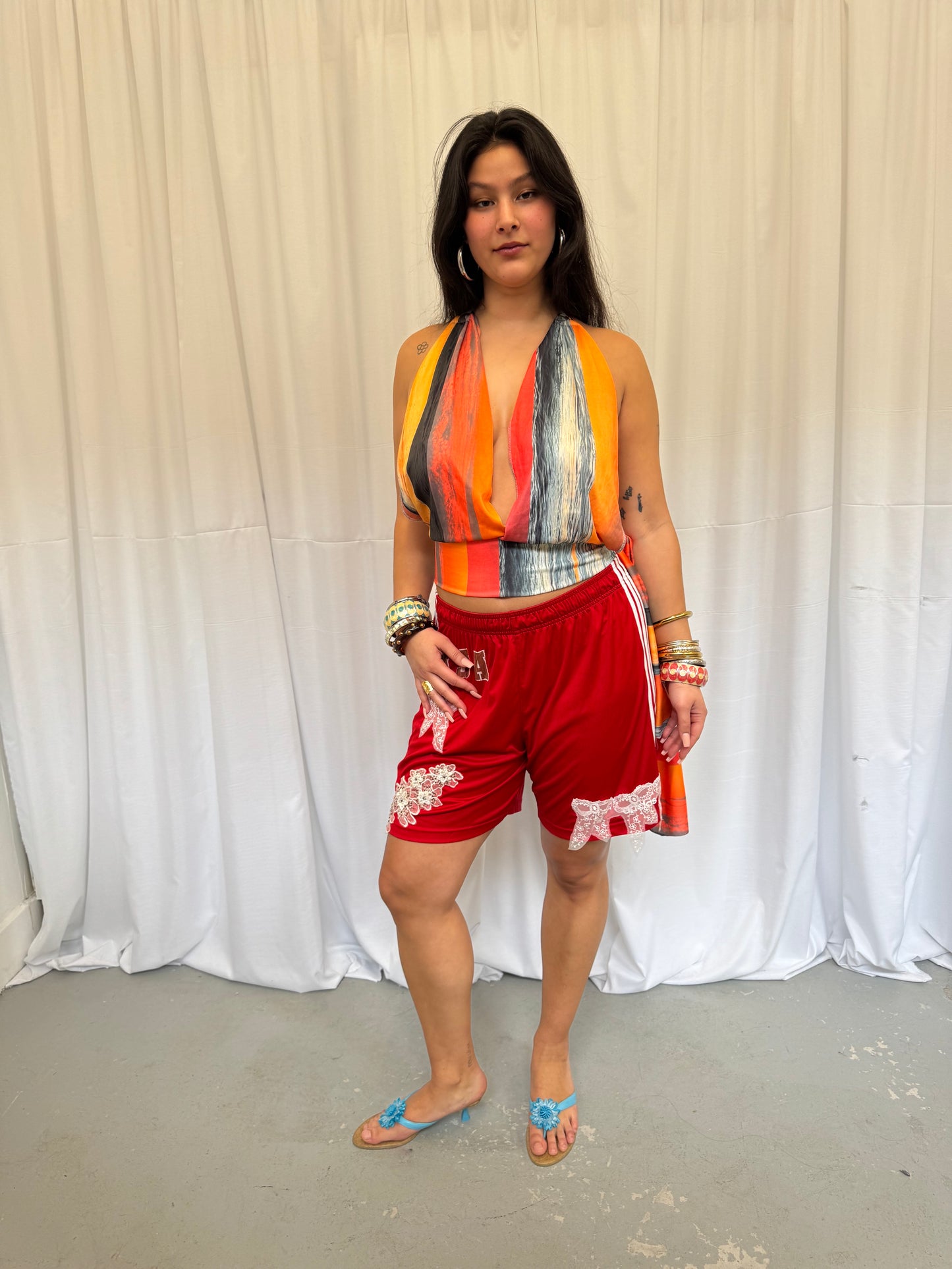 Red Shorts with Flower Embellishment