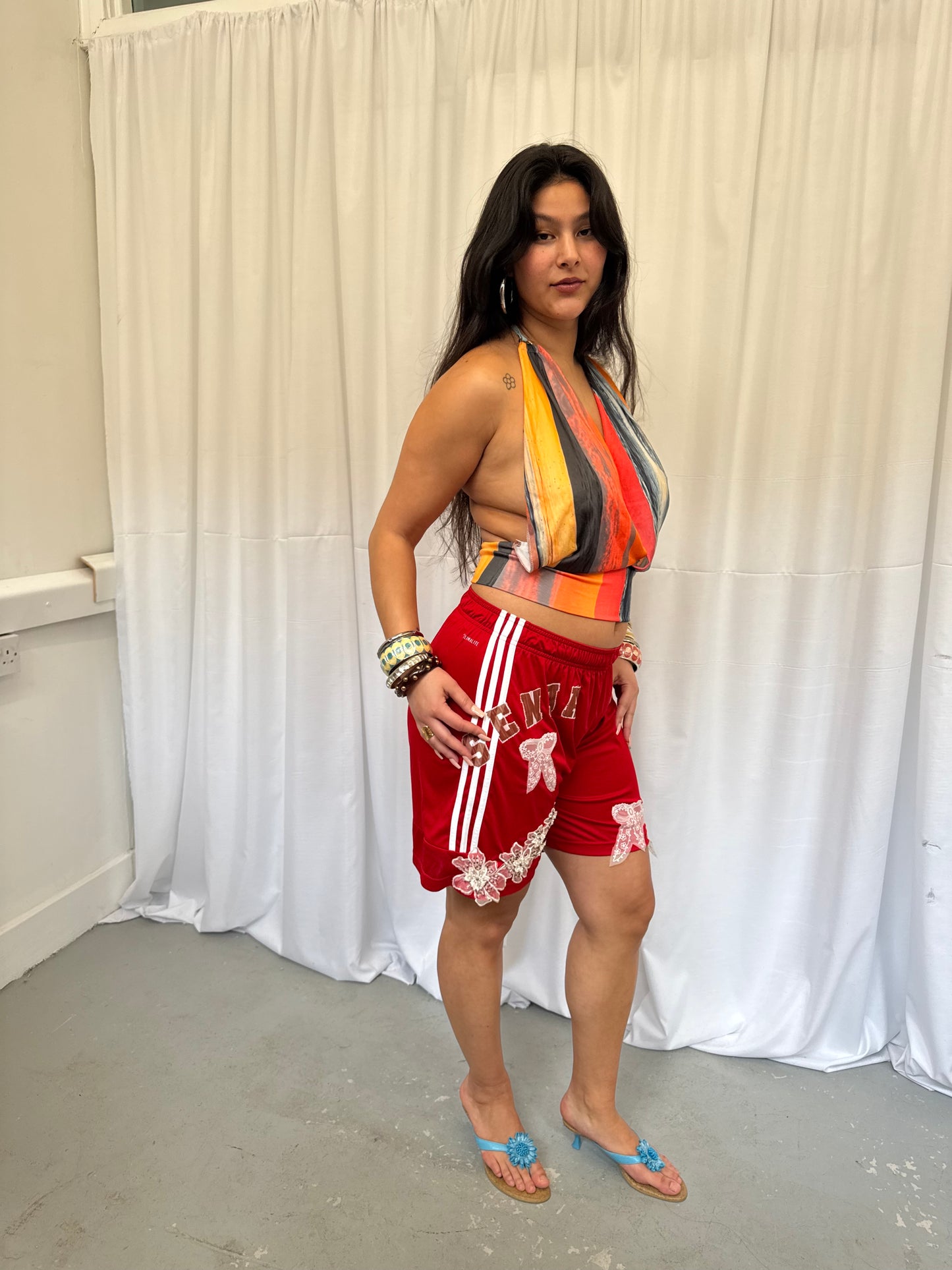 Red Shorts with Flower Embellishment