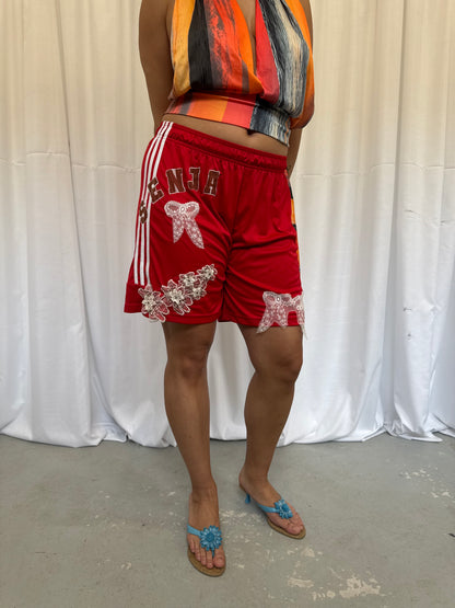 Red Shorts with Flower Embellishment