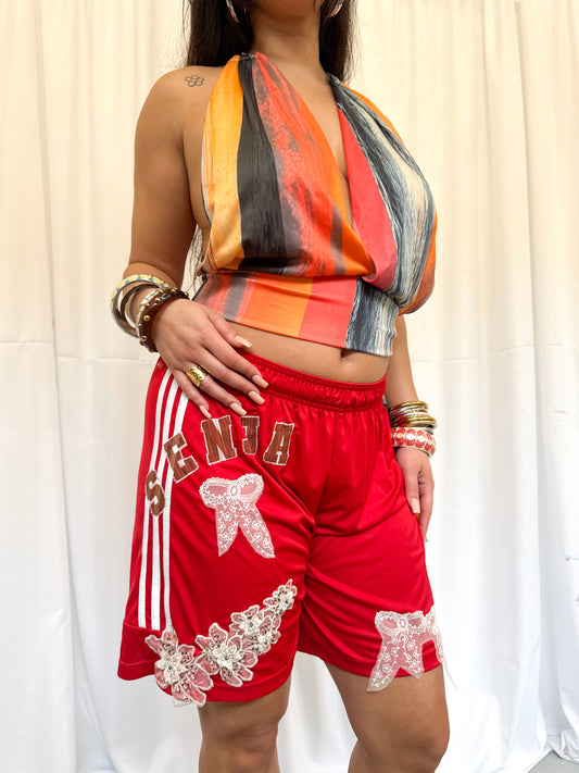 Red Shorts with Flower Embellishment