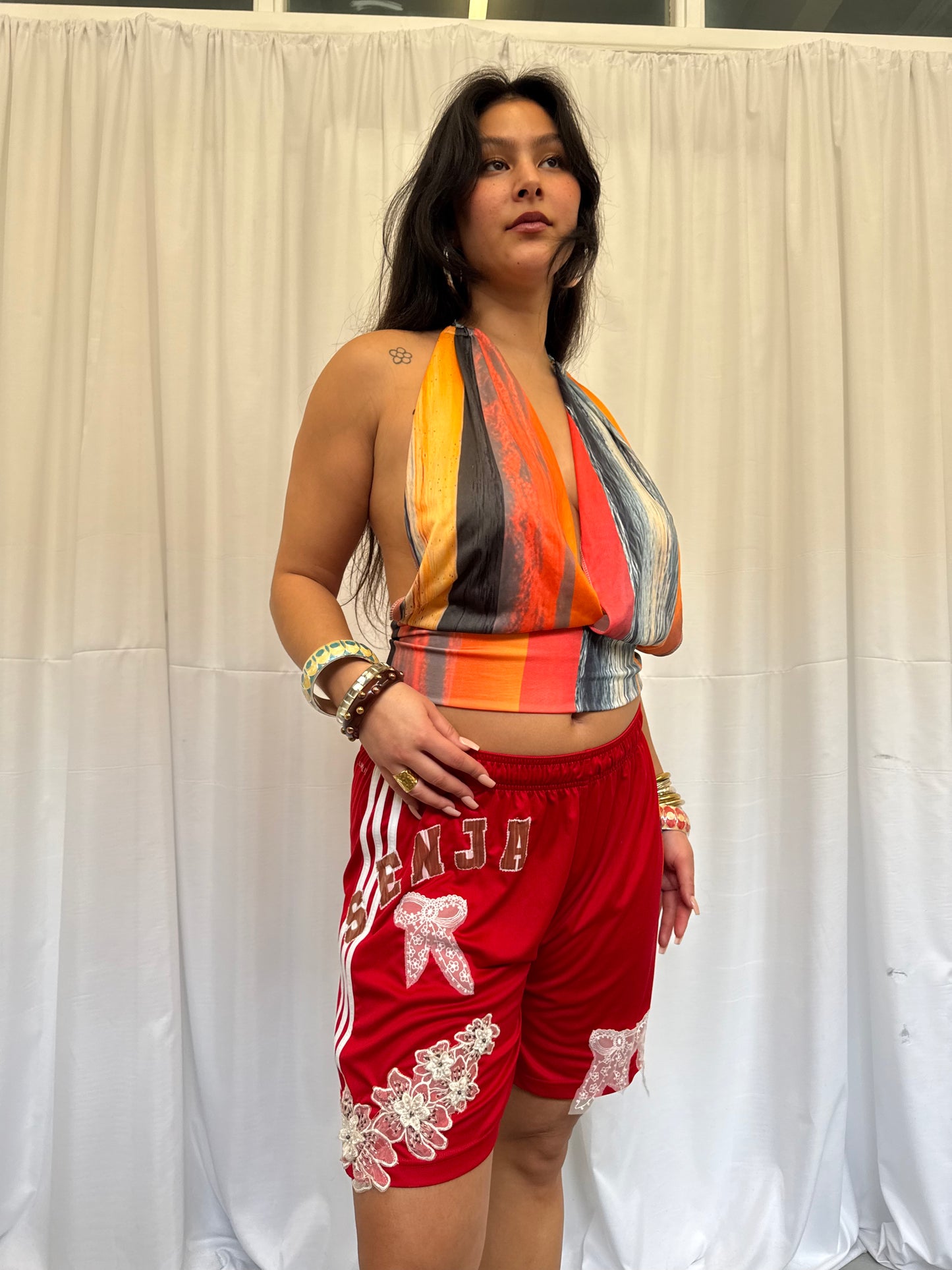 Red Shorts with Flower Embellishment