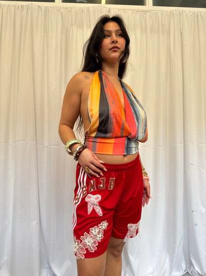 Red Shorts with Flower Embellishment