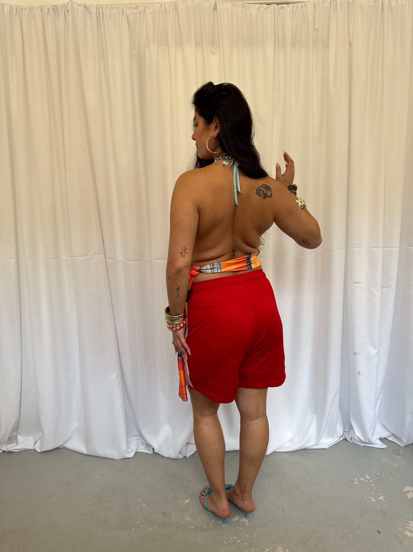 Red Shorts with Flower Embellishment
