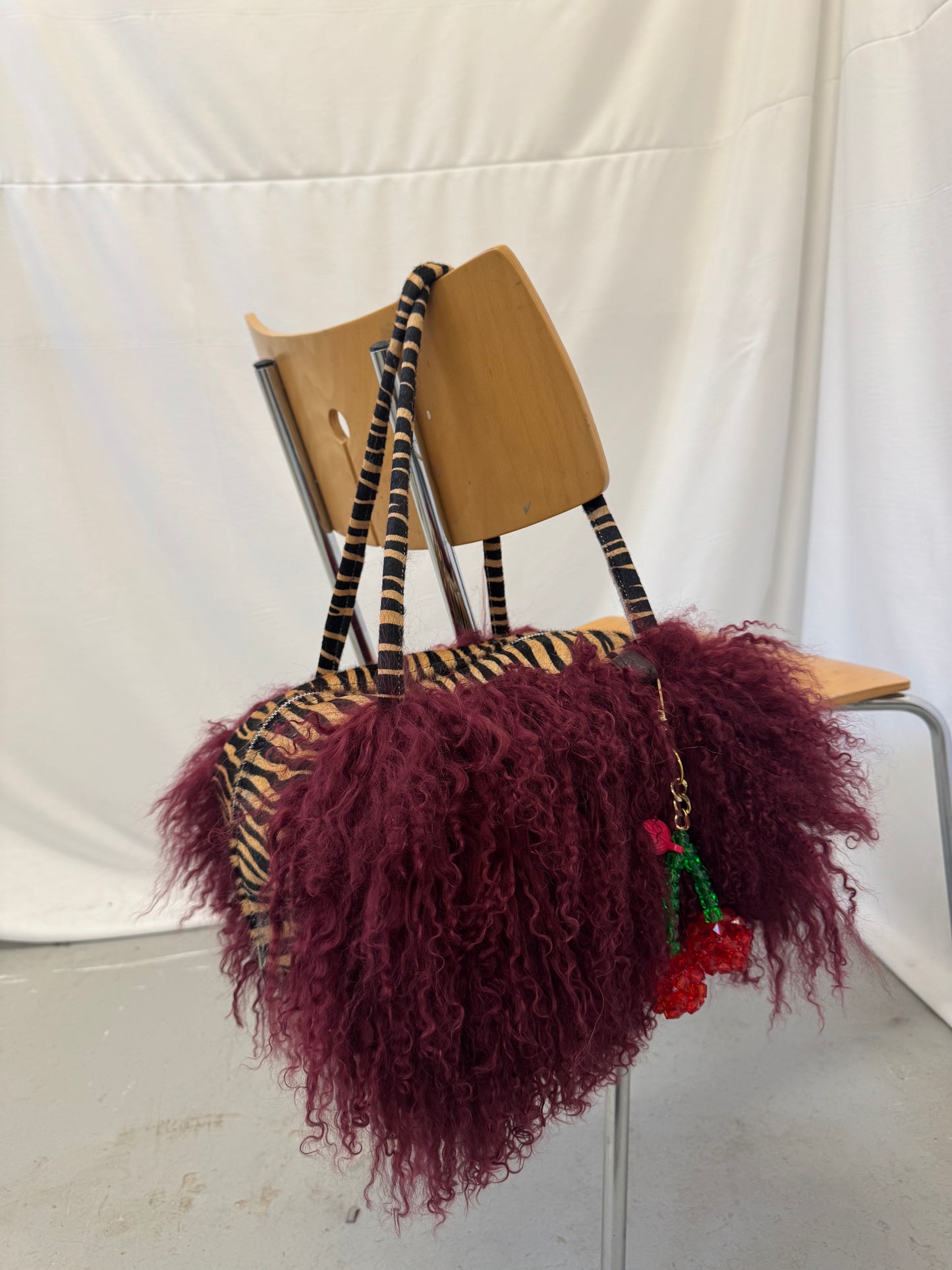 Burgundy Mongolian Wool Bowler Bag with Zebra Print Leather