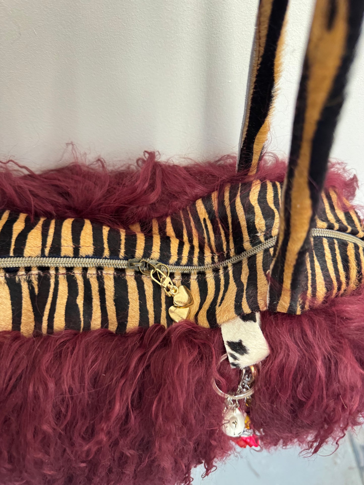 The Burgundy & Zebra Mongolian Wool Bowler Bag