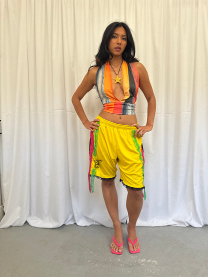 Yellow shorts with pink and green lace