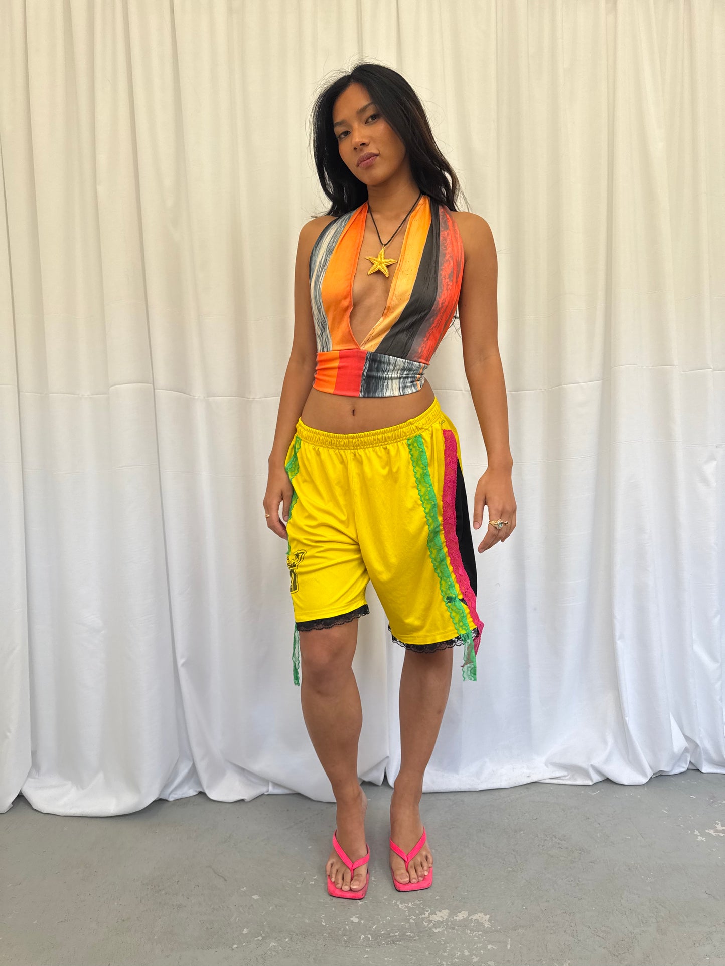 Yellow shorts with pink and green lace