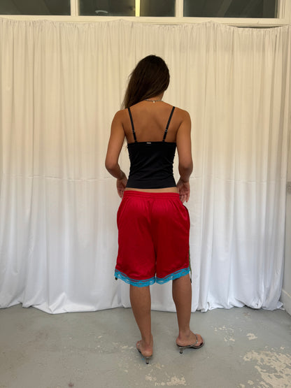 Red shorts with turquoise lace