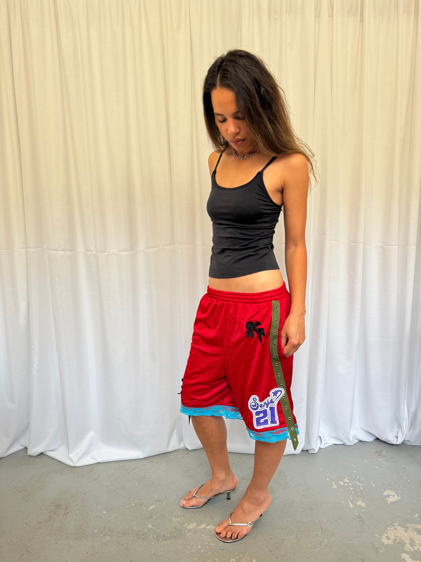 Red shorts with turquoise lace