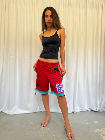 Red shorts with turquoise lace