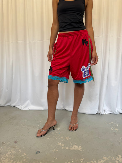 Red shorts with turquoise lace