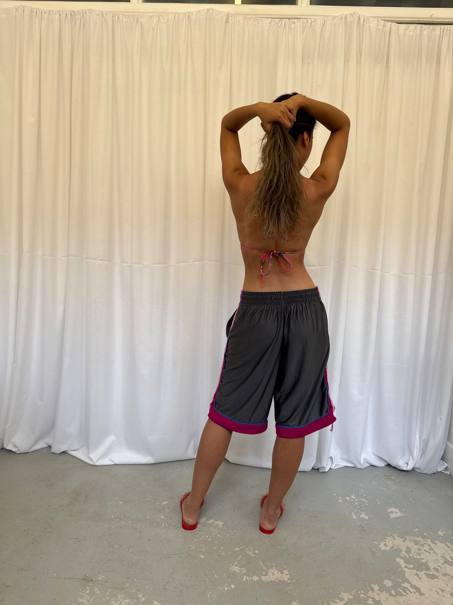 Grey shorts with pink lace