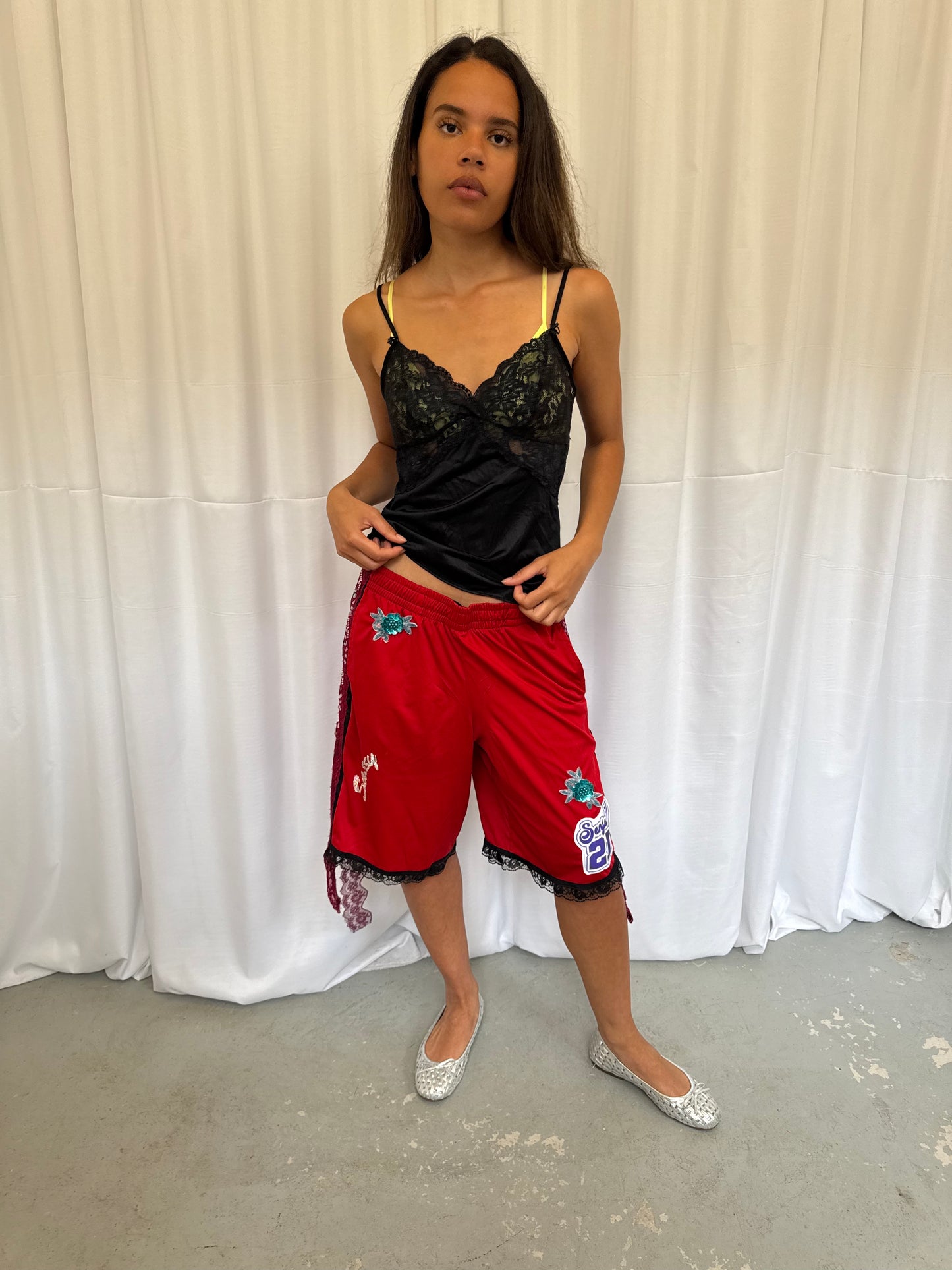 Red shorts with burgundy lace