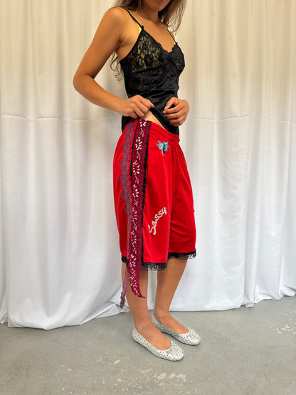 Red shorts with burgundy lace